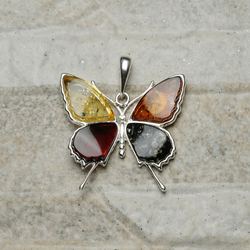 Ciondolo in ambra baltica color miele: pietra naturale incastonata in argento dorato